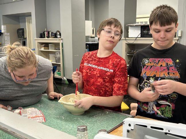 Students learn cooking basics at Kitchen Kamp